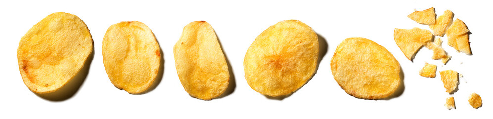 Potato chips, collection of homemade rustic chip isolated on white background, close up. Golden deep fried cutout chips set for your design. Flat lay