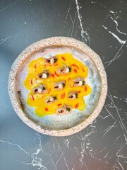 Yellow pepper sauce with marinated fish and chips at StreetXO