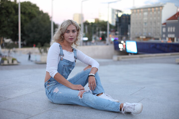 Beautiful woman posing at the street.