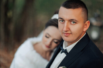 A man and a woman are posing for a picture