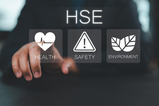 HSE, Health safety environment concept. Standard safe industrial work and industrial. Businessman use tablet with HSE icon on virtual screen for business and organization.