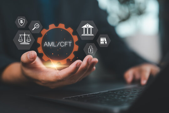 AML : Anti Money Laundering and CFT : Countering the Financing of Terror regulations and compliance concept. businessman use laptop with virtual AML and CFT icons.