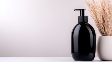 Stylish black bottle positioned beside a decorative vase in a modern hair salon