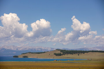 View to the Khuvsgul lake, houses and mountains in Mongolia.