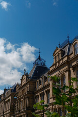 Elegant architecture next to the National Museum in Edinburgh under a blue sky