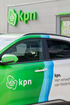 Store sign and service car of KPN, a Dutch telecommunications company, in Arnhem, The Netherlands on July 11, 2024