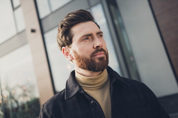 Portrait of handsome dreamy man wear stylish clothes exploring megapolis city autumn day outdoors