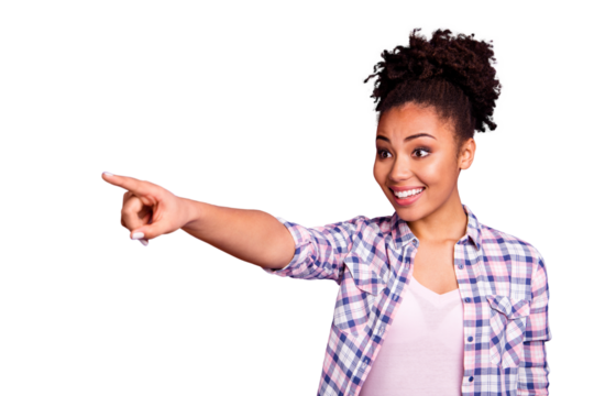 Portrait of her she nice charming cute attractive lovely cheerful cheery wavy-haired girl in checked shirt pointing far indicate index isolated over violet purple pastel background