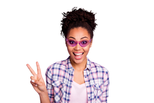 Portrait of funny funky lovely teen teenager summer holiday weekend travel beautiful enjoy rejoice satisfied content make v-sign dressed checked shirt isolated on purple background