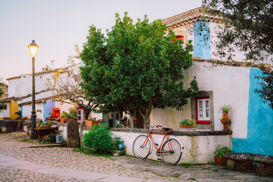 Red Bicycle on Street in Aldeia da Mata Village, Portugal