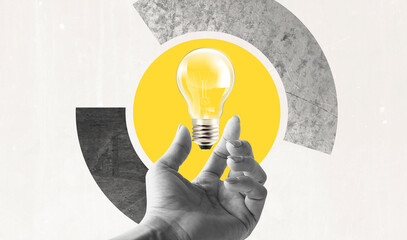 Hands and light bulb which is symbolizing creativity concept and new ideas in business. Vintage Background