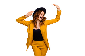 Portrait of her she nice charming cute attractive lovely fascinating fashionable chic cheerful wavy-haired lady wearing yellow suit jacket isolated on bright vivid shine orange background