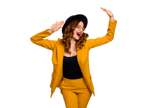 Portrait of her she nice charming cute attractive lovely fascinating fashionable chic cheerful wavy-haired lady wearing yellow suit jacket isolated on bright vivid shine orange background