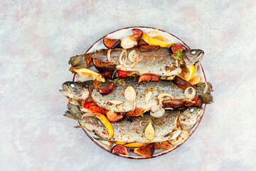 Whole grilled fish served with figs.