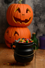 Halloween candy in black cauldron