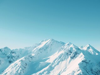 Obraz premium Snow-Covered Mountains Under Clear Blue Sky