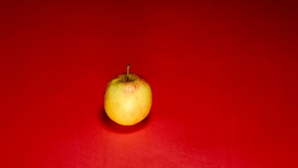 Fresh apple cutting slice on red background 