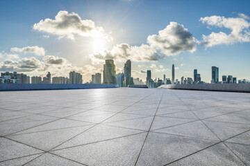 Empty square floor with modern city buildings scenery in Shenzhen. car advertising background.