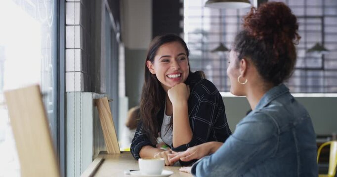 Gossip, talking or women in cafe to drink for a fun reunion, discussion or communication together. Girls, friends or happy people chat in conversation with tea cup at restaurant, diner or coffee shop