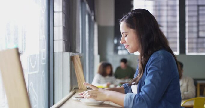 Laughing, phone or happy woman in cafe thinking of social media for meme or website drinking tea. Mobile app, smile or person in coffee shop texting online or reading a funny joke on internet post