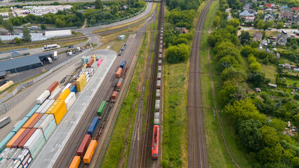 Drone photography of a railway in an old industrial part of a city during summer day