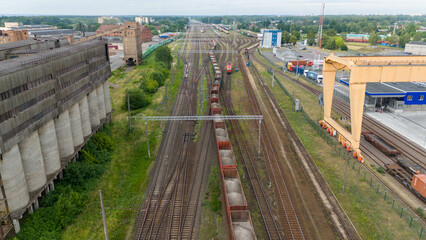 Drone photography of a railway in an old industrial part of a city during summer day