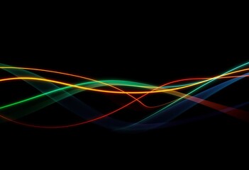 Naklejka premium Brightly colored light trails overlapping on a dark background