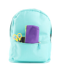 Backpack with different school stationery isolated on white
