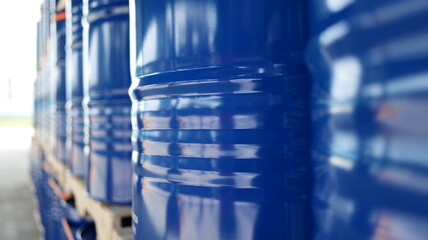 Barrels of 200 liters each, neatly stored in a warehouse, showcasing efficiency in chemical and oil handling for import-export.