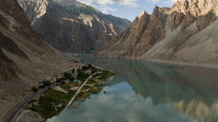 Aerial view of Attabad lake  during sunrise, its located in the district of Hunza, GIlgit Baltista in Pakistan. Karakoram range of the Himalayas