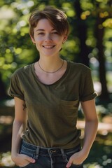 Fototapeta premium A woman stands in front of trees wearing a green shirt, possibly hiking or exploring