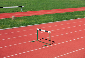 hurdle in athletic track field