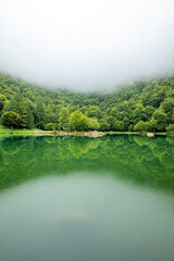 Lac de Bethmale - Pyr&eacute;n&eacute;es - Ari&egrave;ge - Foggy Lake Reflection in a Green Valley