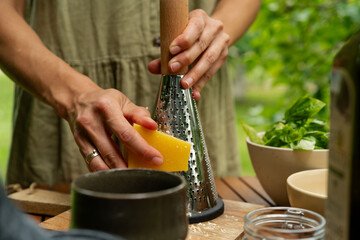 Traditional Pesto Making: Basil, Parmesan, Pine Nuts, and Garlic in Harmony