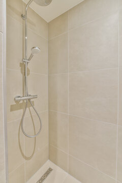 Modern Shower Head and Fixture in Beige Tiled Bathroom