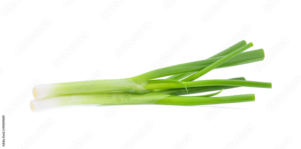 Wall mural Fresh, organic leeks on white background.