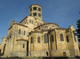 Romanesque Abbey of Saint-Austremoine. Issoire. Auvergne. France. 12th century. General view of the apses and the bell tower. 