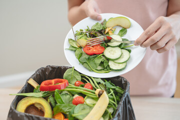 Food waste environment concept, people throwing food garbage into bin prepare to decompose.