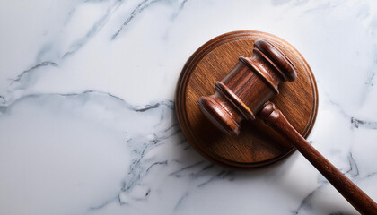 Wooden gavel on marble surface. Judge's hammer. Law and justice concept, constitution, courtroom