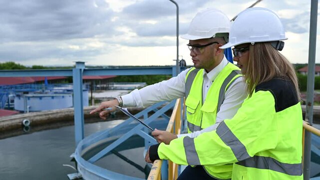 Environmental engineers work at wastewater treatment plants,Water supply engineering working at Water recycling plant for reuse