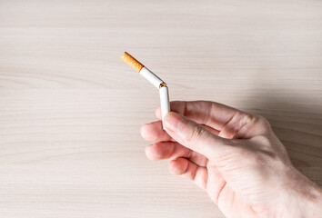 Broken Cigarette in a Hand closeup