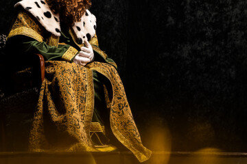 One of the three wise men lavishly dressed in traditional royal attire