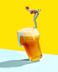 Poster. Contemporary art collage. Swimmer standing on edge of glass of beer ready to dive to pool of fun and rest. Concept of summer, holidays, celebration, Friday mood, festivals. Ad