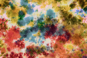 tie dye pattern hand dyed on cotton fabric abstract texture background.