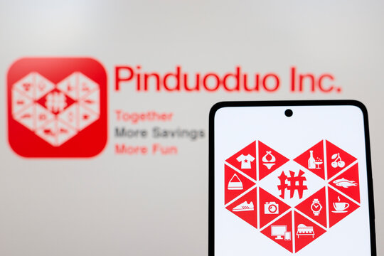 August 26, 2024, Paraguay. In this photo illustration, the Pinduoduo (PDD Holdings) logo is displayed on a smartphone and in the background.