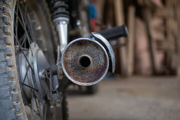 close up of rusty motorbike exhaust