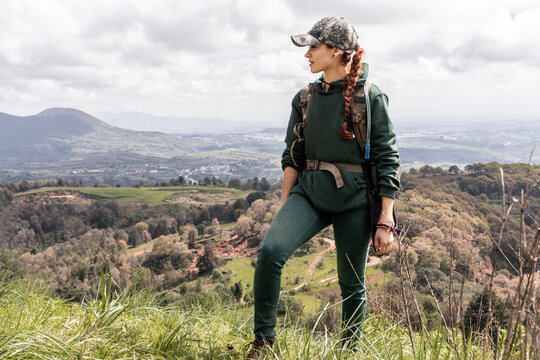 Female hiker enjoying scenic mountain view