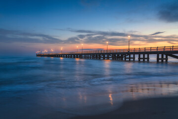 The pier of Forte dei Marmi at sunset. Versilia, Tuscany, Italy