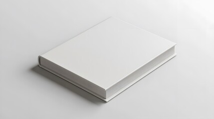 Fototapeta premium Minimalist Notebook: A closed, plain white notebook with a smooth cover, lying flat on a white background, with subtle shadowing for a clean aesthetic. 