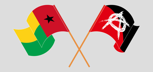 Crossed and waving flags of Guinea-Bissau and Anarchy